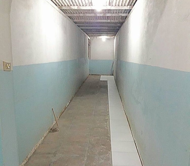 Piso da rampa sendo reformado.